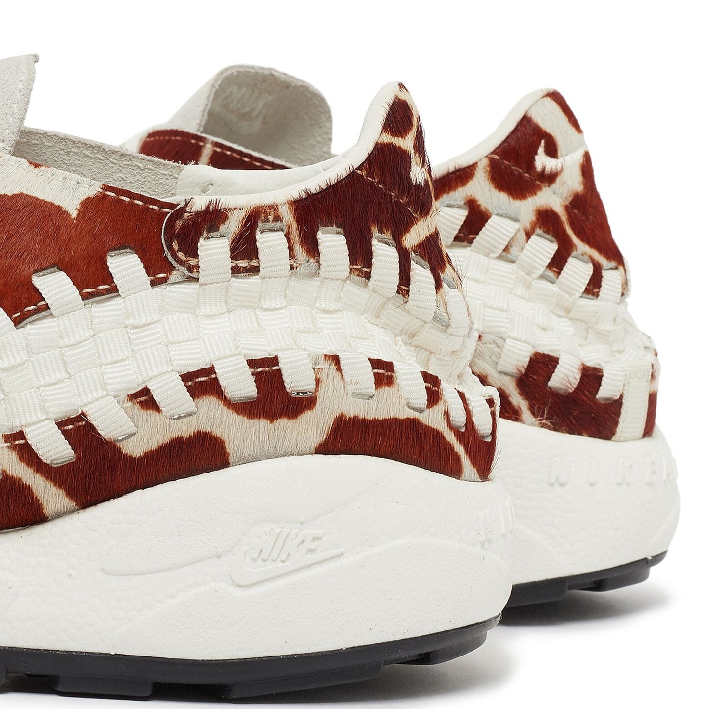 Nike Air Footscape Woven cow print sneakers