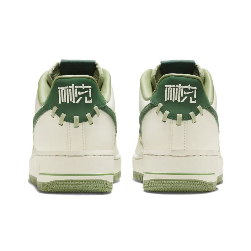 Nike Air Force 1 Low "NAI-KE" Surfaces in Green Weaves