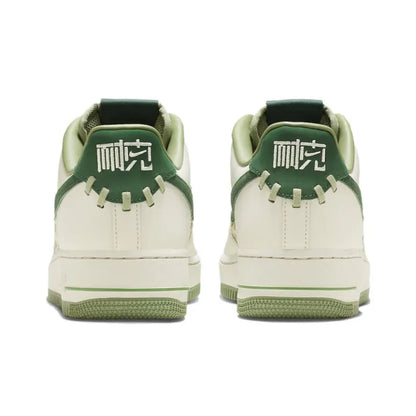 Nike Air Force 1 Low "NAI-KE" Surfaces in Green Weaves